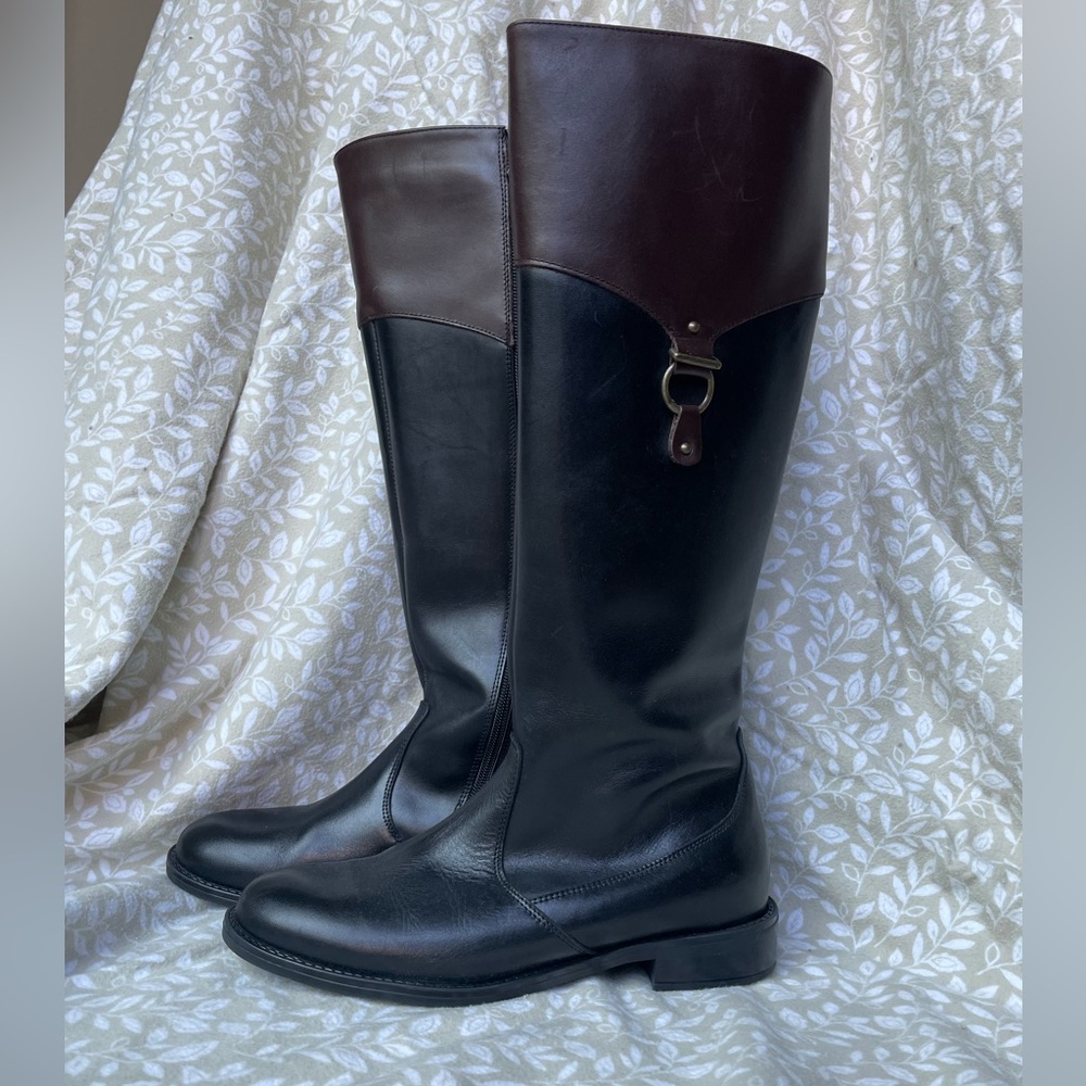 Italian leather two tone boots with buckle accent.